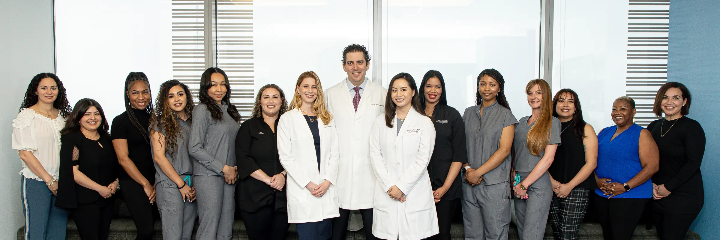 The entire staff at Dermatology & Laser Surgery Center posing for a photo