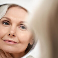 happy older woman with radiant beautiful skin