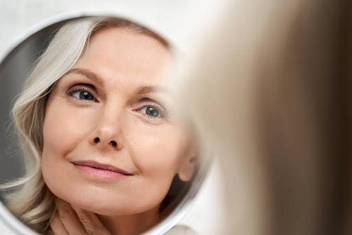 happy older woman with radiant beautiful skin